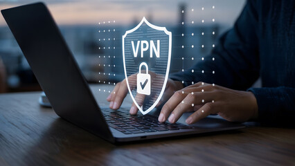 Person uses VPN on a laptop for secure network, data protection, and cybersecurity to prevent threats on the internet to ensure privacy and encrypt the connection.