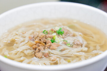A comforting bowl of Taiwanese minced pork noodles served in a light savory broth. Tender noodles...