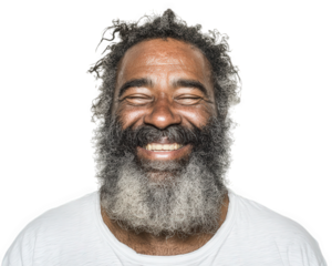 Smiling elderly man with gray curly hair and beard wearing white shirt, expressing happiness and warmth with closed eyes and broad smile