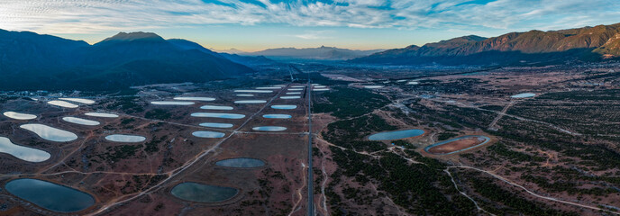 The artificial lake landscape at the foot of Yulong Snow Mountain