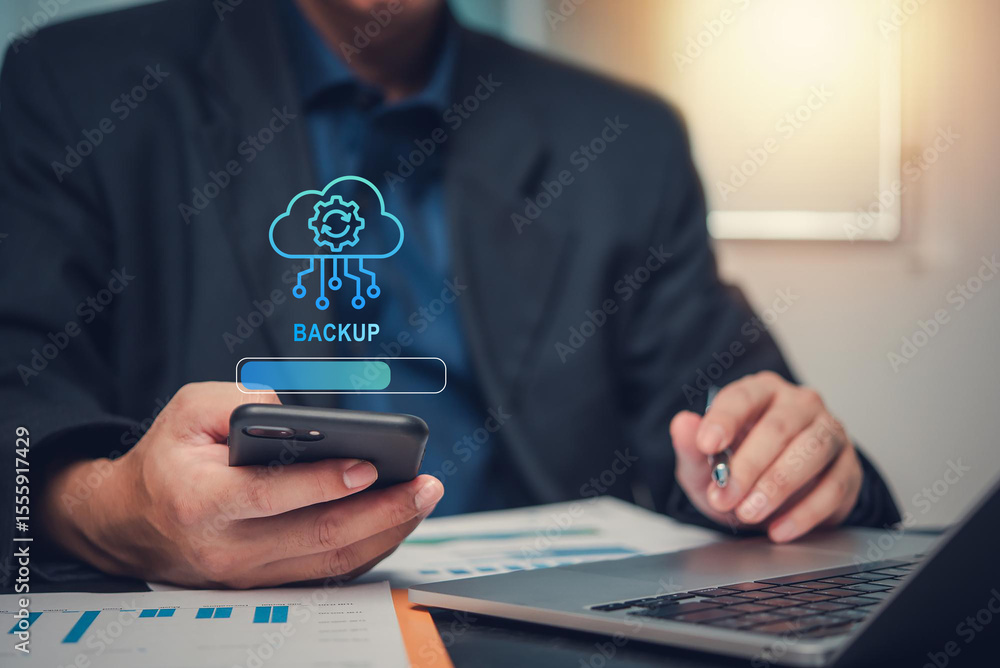 Aufkleber Backup concept, Online digital data storage and connection service. Businessman using smartphone with backup status bar for data backup management.