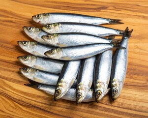 fresh sardines on wooden floor, sardines fishes on wooden background