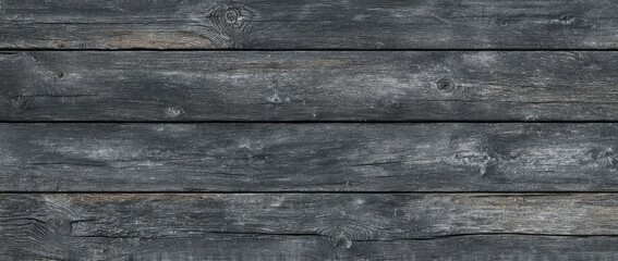 Dark gray weathered wood planks, horizontally arranged, showing grain and texture