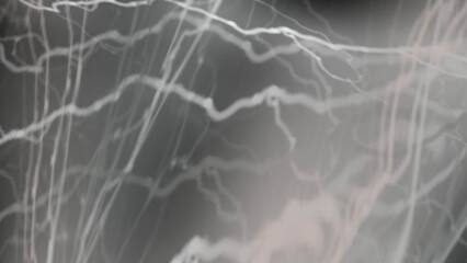 Abstract light streaks create a contemporary and dynamic gray background