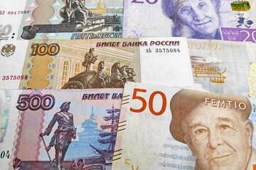 Stack of Russian Rubles and Swedish Kronas