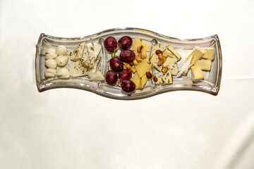 Assorted cheeses, different cheese types, isolated on white background. Top view 