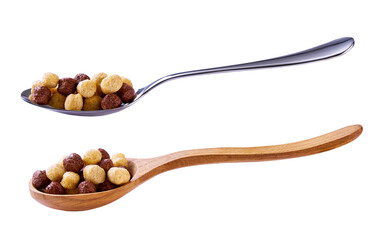 corn balls  and chocolate corn balls in a metal spoon isolated on white background.