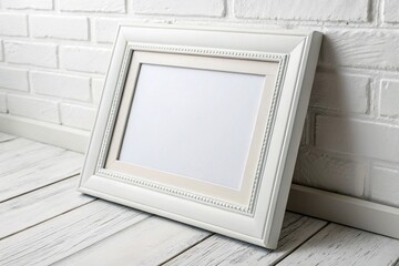 White photo frame mockup on white background. Blank space for artwork, photography, or poster design. Ideal for modern interior, wall decor, and product presentations.