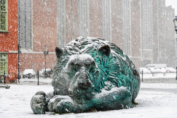 Four Quarters Fountain Lion and st. Mary's Church on the background in Gdansk