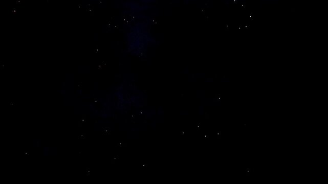 Colorful holiday fireworks bursting in the night sky during a festive celebration