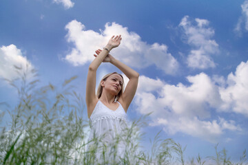 Young beautiful girl in nature in a rustic style.