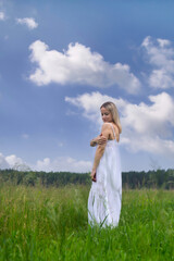 Young beautiful girl in nature in a rustic style.