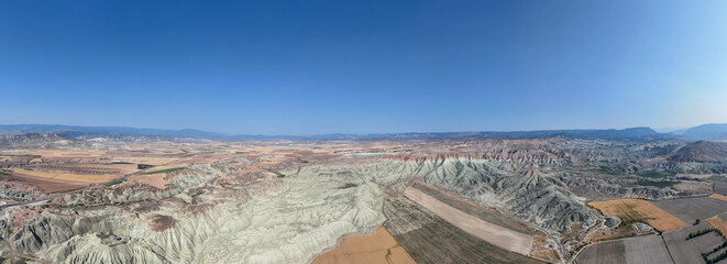 Nallihan Bird Sanctuary Beypazari Ankara Turkey Panoramic view of a colorful eroded landscape under a vibrant blue sky. A breathtaking panoramic view of a unique, colorful landscape. Nallıhan Turkiye 