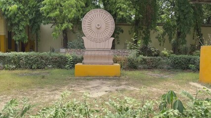 Ashoka Chakra is an Indian symbol which is a depiction of the dharmachakra. A stone skulpture at sarnath stupa called Dharmachakra Pravartana, or "Turning of the Wheel of Dharma