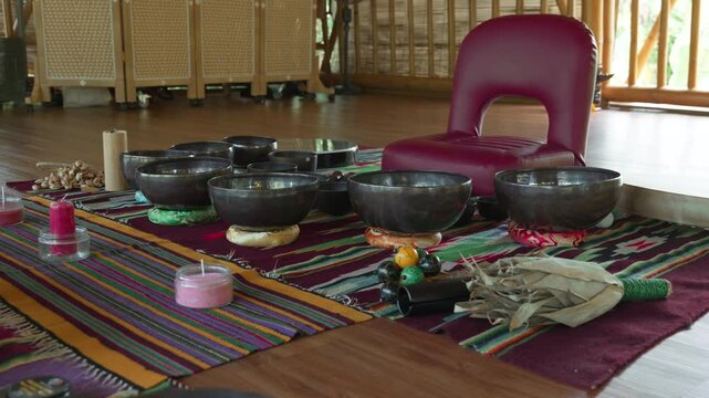 Tebet singing bowls stand on the floor before the start of the bowls ceremony