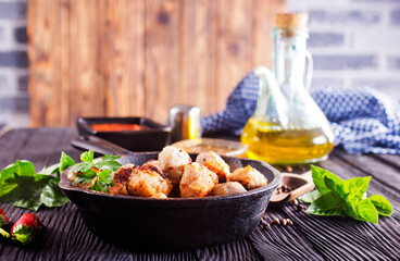Meat meatballs with spices, sauce and garlic. Top view, copy space.
