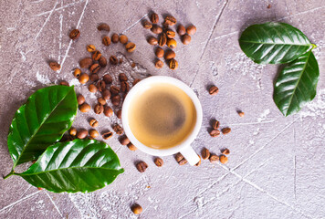 Coffee cup and coffee beans on gray background, Black coffee cup aromatic