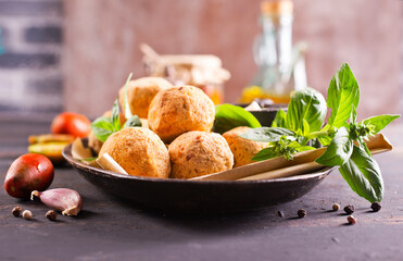 Overhead image of arabic snack falafel in the form of chickpea balls with spices.
