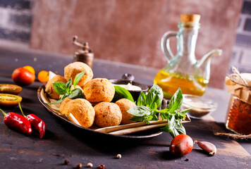 Overhead image of arabic snack falafel in the form of chickpea balls with spices.