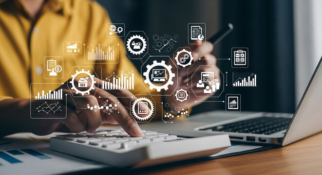 Hands using calculator, laptop, and digital interface showing graphs and business icons, representing data analysis, financial management, and technological solutions for business
