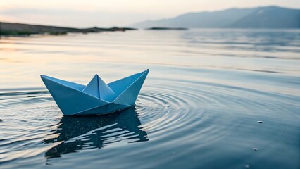 Fototapeta premium blue stylish paper boat on sea water 