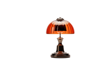 Elegant amber glass table lamp with ribbed shade, illuminating a dark background. background removed