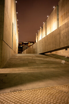 EDP Sede II in Lisbon, Portugal, at night, designed by acclaimed Chilean architect Alejandro Aravena and his firm Elemental.
