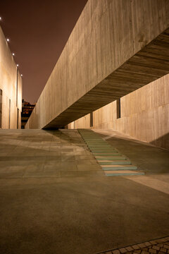 EDP Sede II in Lisbon, Portugal, at night, designed by acclaimed Chilean architect Alejandro Aravena and his firm Elemental.