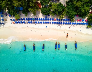 Aerial View of Tropical Beach with Boats and Umbrellas