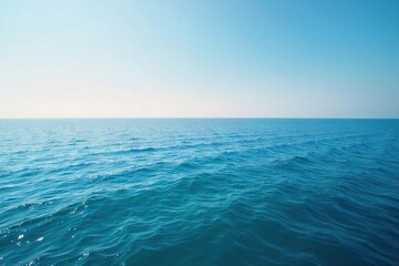 Obraz premium Serene Ocean Horizon Vast, Unbroken Expanse of Calm Water Meeting the Sky ? Ideal for Travel, Nature, and Serenity-Themed Projects, Desktop Wallpapers, and Website Backgrounds