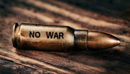 close-up of a single brass bullet with engraved no war message on wooden surface, symbolizing anti war protest, military conflict critique, and peace advocacy

