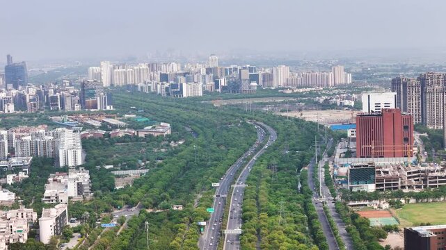 Aerial drone shot showcasing a clean, well-planned road network in Noida.