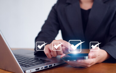 Businesswoman mark checkboxes, Survey form, check marks on checklist,Checklist concept.