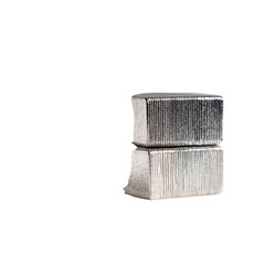 A Minimalist Composition: Stacked Silver Blocks Against a Dark Backdrop