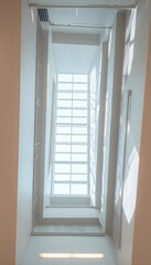 Fototapeta premium Interior view of off-grid smart home ceiling showcasing retractable ventilation and solar control unit