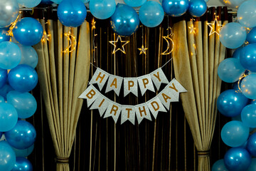 Elegant Blue and Gold Birthday Party Decorations: Balloons, Banner, and Fairy Lights