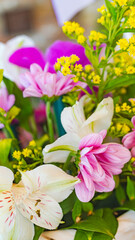 Beautiful flower arrangement with white and pink orchids.
