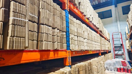 Warehouse storage shelves with stacked boxes industrial logistics