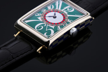 Elegant fashion wristwatch with rectangular case, unique green dial featuring large retro-style numerals. A luxury timepiece that blends artistic expression with vintage charm.
