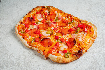 Delicious rectangular pizza with colorful toppings and a golden crust invites all to enjoy