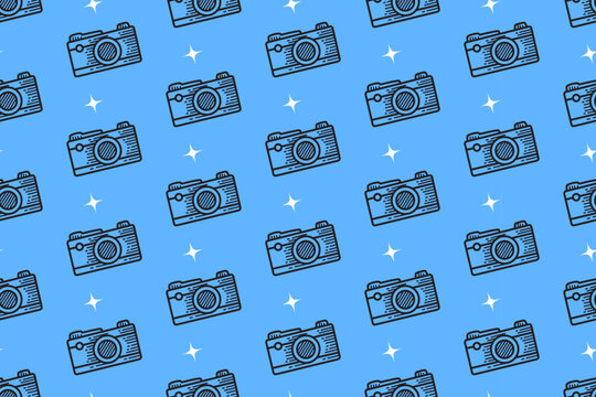 retro camera with light doodle pattern on blue background for packaging and merchandise. vintage photography engraving seamless pattern background. hand drawn photo gear motif wallpaper design