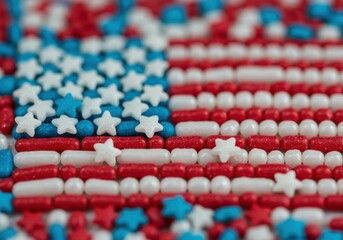 Obraz premium American flag made of red white and blue sprinkles close up view