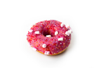Colorful pink donut with sprinkles and marshmallows on a white background for dessert lovers