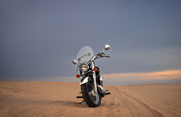 Adventure motorcycle in the Namib Desert – premium stock photo capturing off-road freedom,...