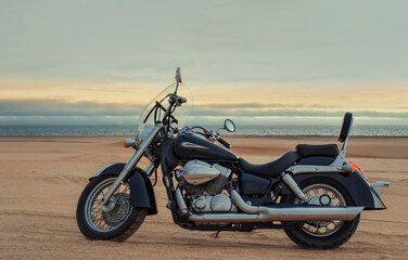 Adventure motorcycle in the Namib Desert – premium stock photo capturing off-road freedom,...