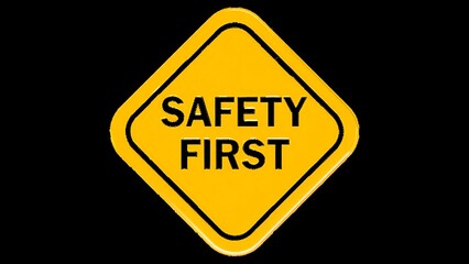 Yellow safety sign with bold text highlighting "Safety First" against a black background, a crucial reminder for workplace safety.