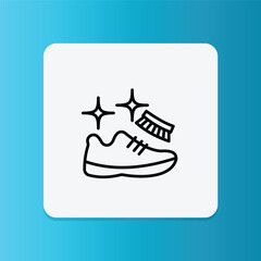 Icon of hand cleaning shoe with sparkles, representing easy-to-clean or washable footwear.