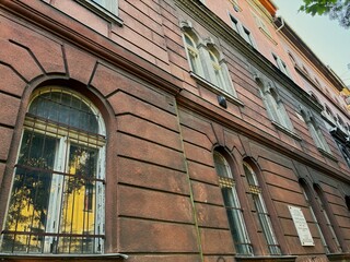 Old urban brick building facade.