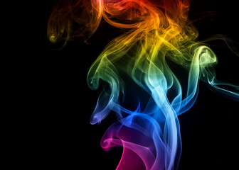 Abstract colored puffs of smoke swirls overlay on black background. Royalty high-quality free stock photo image of abstract colorful smoke overlays on dark background. Multicolor smoke swirl fragments