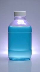 Transparent Plastic Bottle Filled with Bright Blue Coolant on Reflective Surface in Minimalist Setting